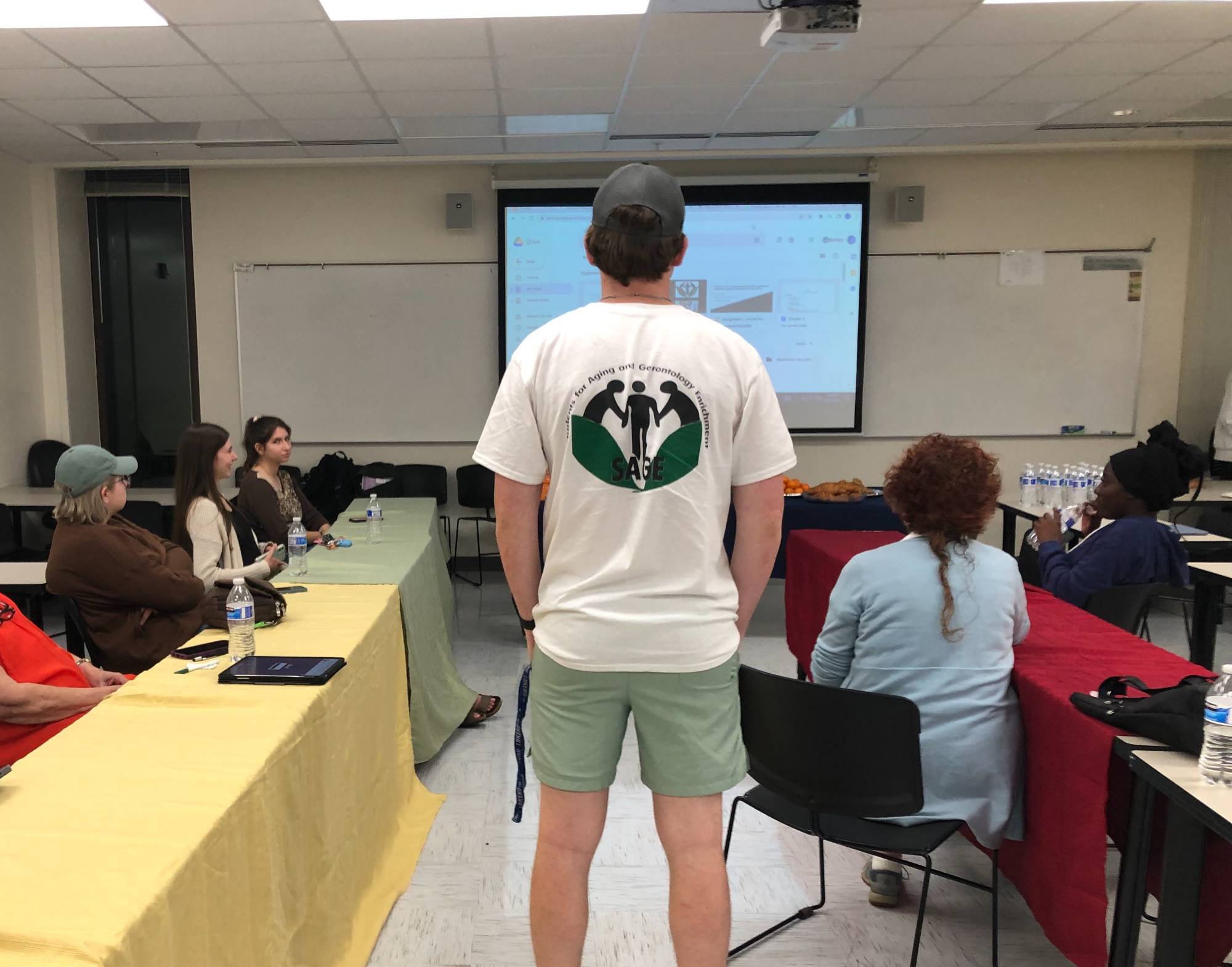 SAGE student standing